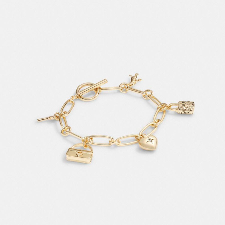 Joyeria COACH Mujer Doradas | 798-DRAXLO